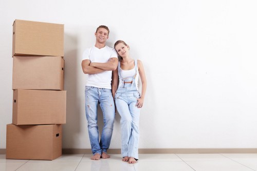 Removal van and moving boxes in a residential street in Ealing