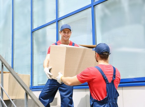 Packed boxes and furniture ready for transport during a local Ealing move