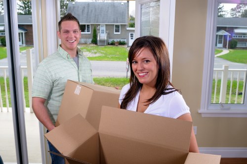 Packed boxes and protective wrapping prepared for removals in Ealing