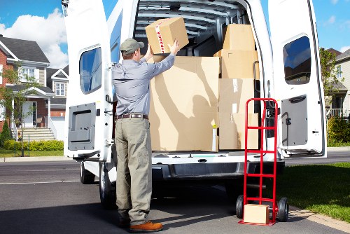 Packed household items and furniture ready for transport in Ealing